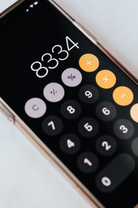 phone with open calculator app on screen