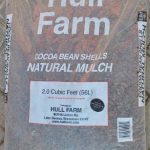 bag of cocoa bean shell mulch, package reads, "Hull Farm cocoa bean shells, natural mulch"