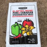 bag of peat moss with package that reads, "Ferti-lome all natural organic pure Canadian sphagnum peat moss"