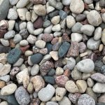 close up of landscape rocks in a mix of colors i in grays, beiges, and pinks